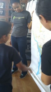 Earth Conservation Corps (ECC) are working together as part of the Anacostia Watershed Outreach and Education Initiative to educate students .